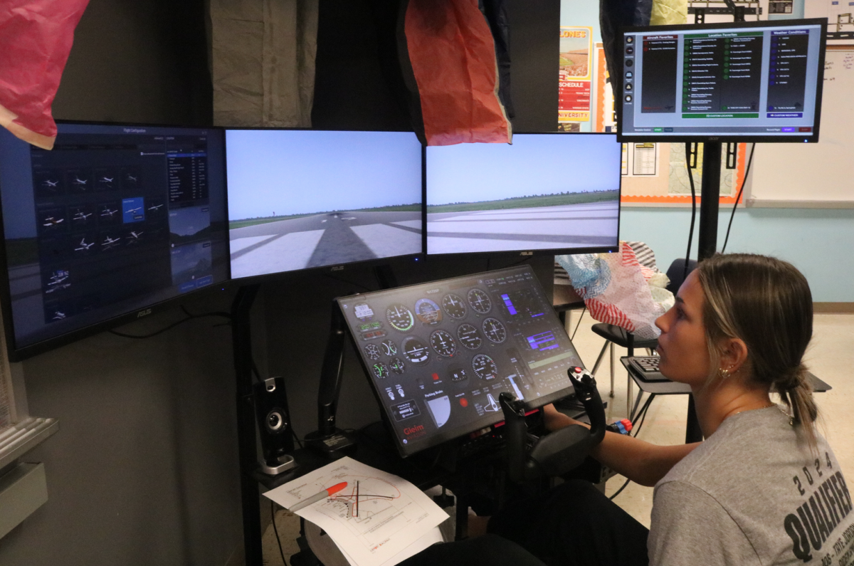 Junior Adler Bruce practices taking flight on the avation simulator in Mr. Smith's class on 11.08.24.