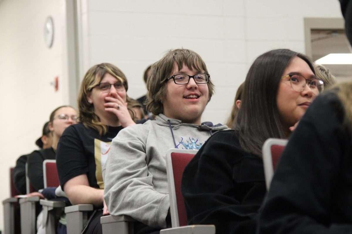 Sophomore Beau Buskirk shows interest in Payne's way of speaking. He enjoyed many of the tricks she performed. Payne addressed students and staff for about 45 minutes.