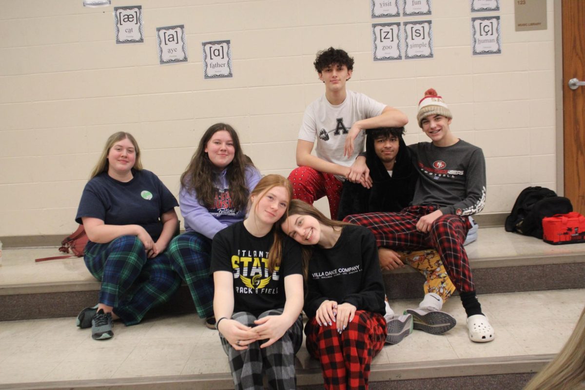 CHRISTMAS SPIRIT-- Pictured are Trojans on the last day before break, in their Christmas Pajamas. 