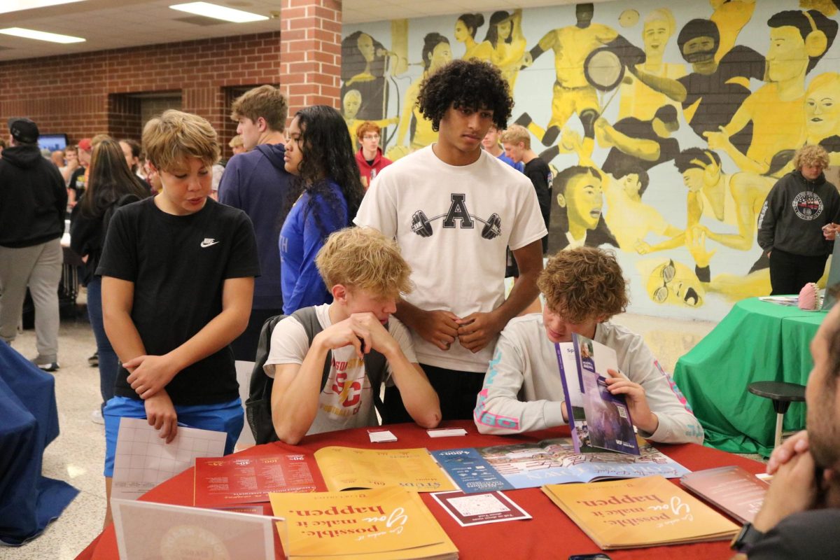 FUTURE PLANS-- Students Kinnick Juhl and Aiden Crawley discuss Simpson College and its amenities. 