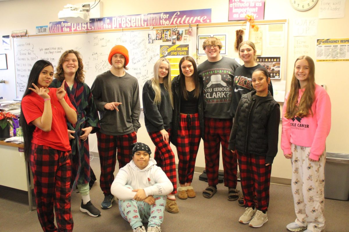 Students in Mr. Petersen's Seminar pose for a picture documenting their Christmas spirit. 