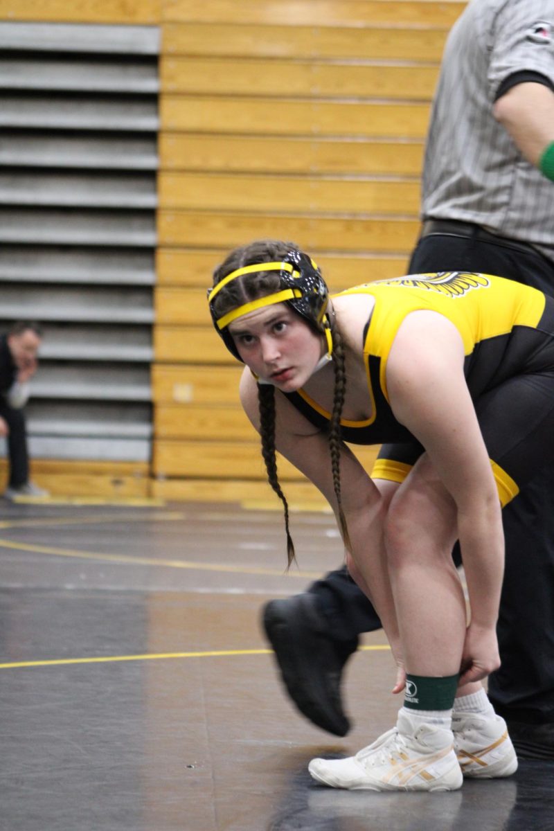 LOCKED IN- Sophomore Alivia Knuth focuses in on her match. This was Knuth's first year of wrestling. She won her first match ever.