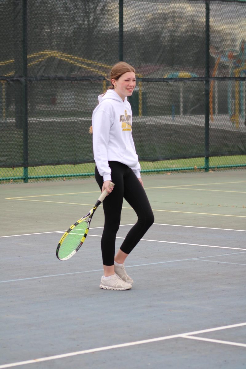 Taryn O'Brien smiles through the match. She didn't let the cold weather get to her and kept a smile on her face while she played. O'Brien is very happy with how the season went and can't wait to play in the fall for the next season. 