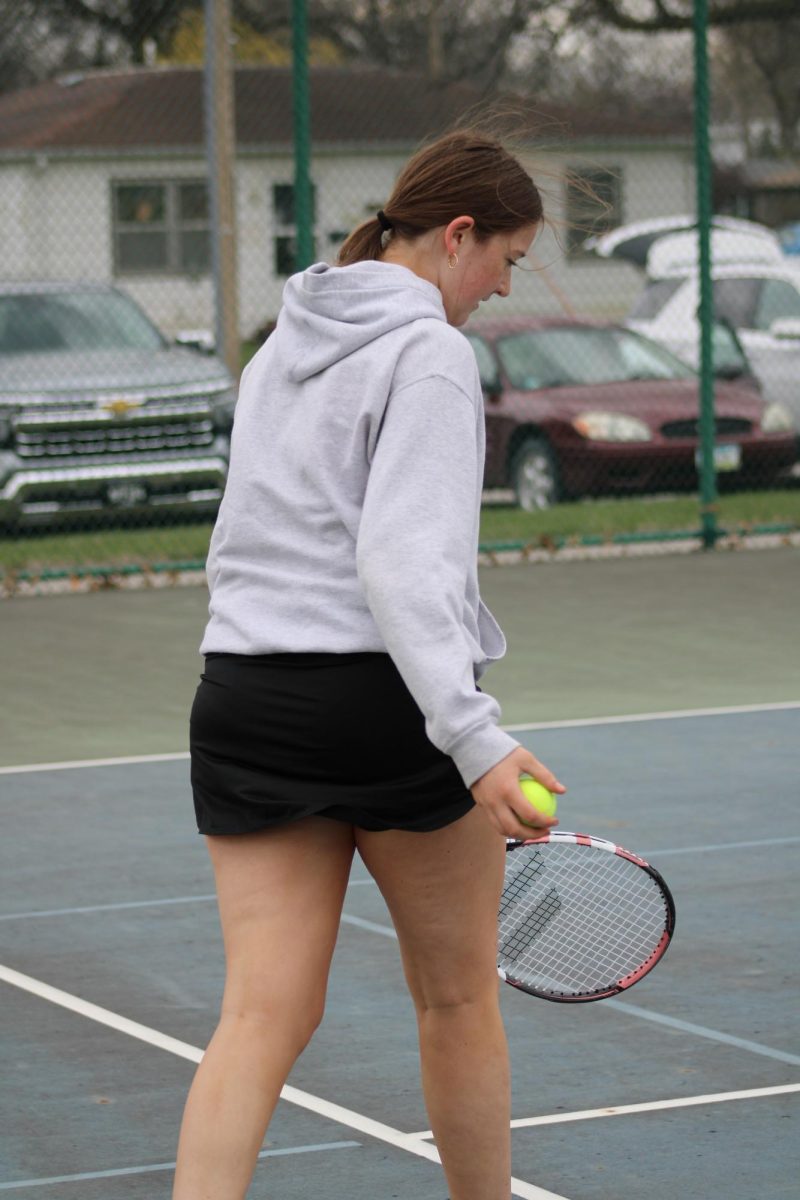 Aubrey Winford gets ready to serve. She played on varsity this year and said she has really improved over the course of the season. She is proud of her self and can't wait to have a great season next year. 
