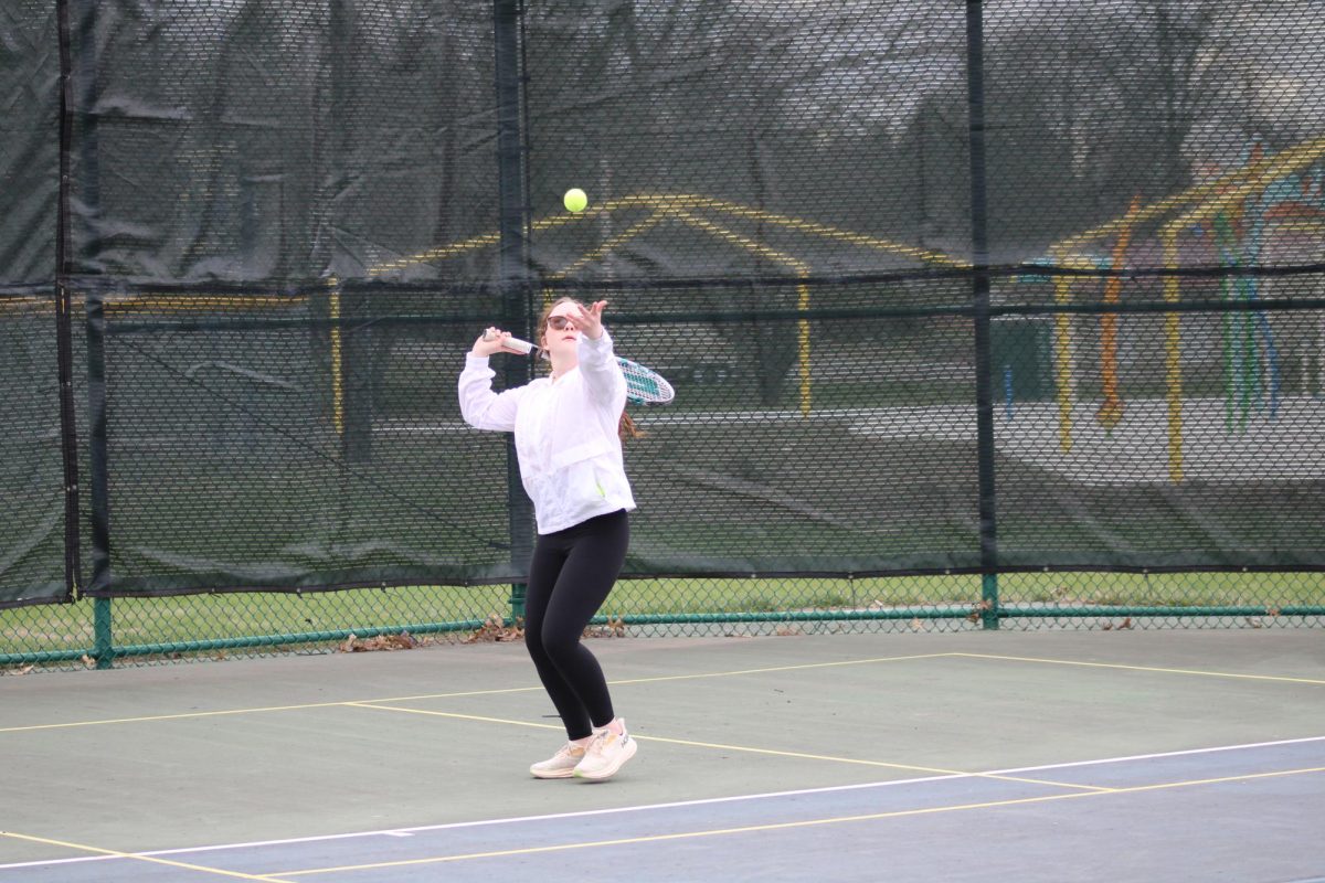 Eleanor Butler serves at hard hit against her opponent. Butler has worked hard the season to maintain her spot in the rankings. She had a good season and can't wait to come back in the fall to play more tennis. 