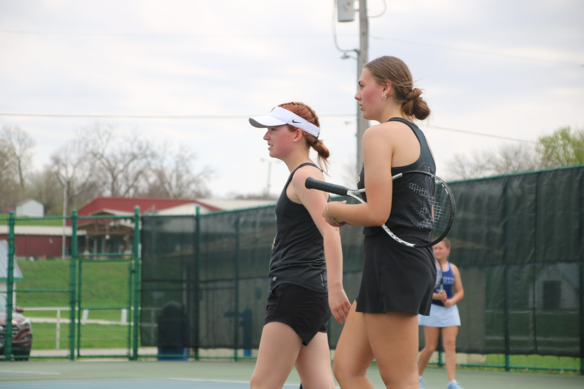 Margaret McCurdy and Olivia Jensen talk it out. They played doubles together in the home tournament. They played hard and placed 4th in the division 2 doubles bracket. 
