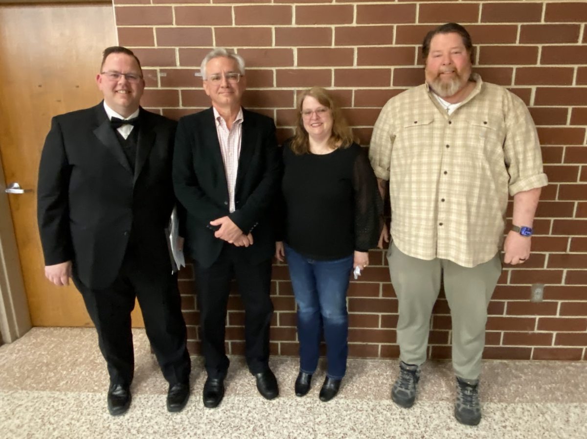 Band director Jarrod O'Donnell, composer and Iowa State Band director Michael Golemo, Sue Anderson and Steve Anderson, Avery's parents