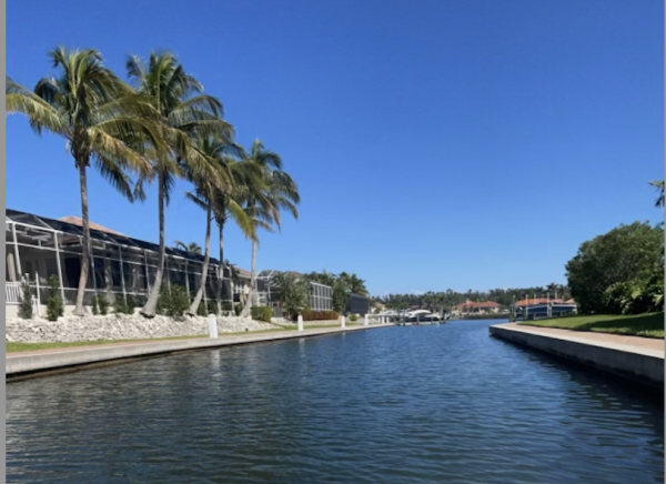 VIEW FROM THE BOAT - Palm trees line the waterway in Anna Maria, Fla. 