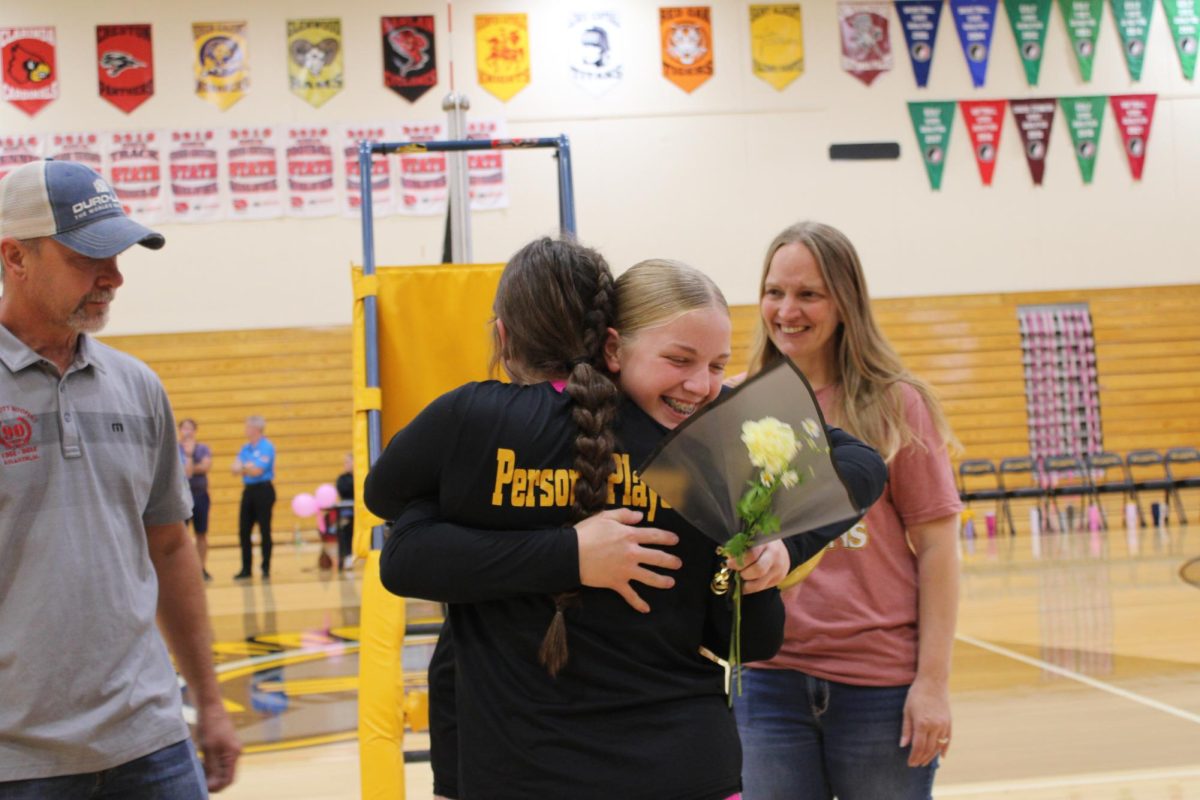 Alivia Knuth gives Claire Schoder a hug after she game Schroder her senior night gift. This night was very emotional for the girls, and there were a lot of tears shed for the seniors. 