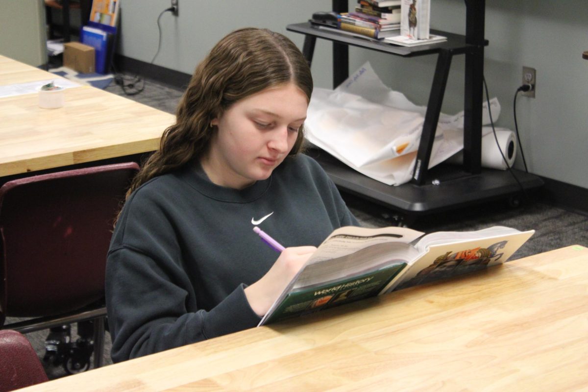 Faith Larsen is doing her work for history.