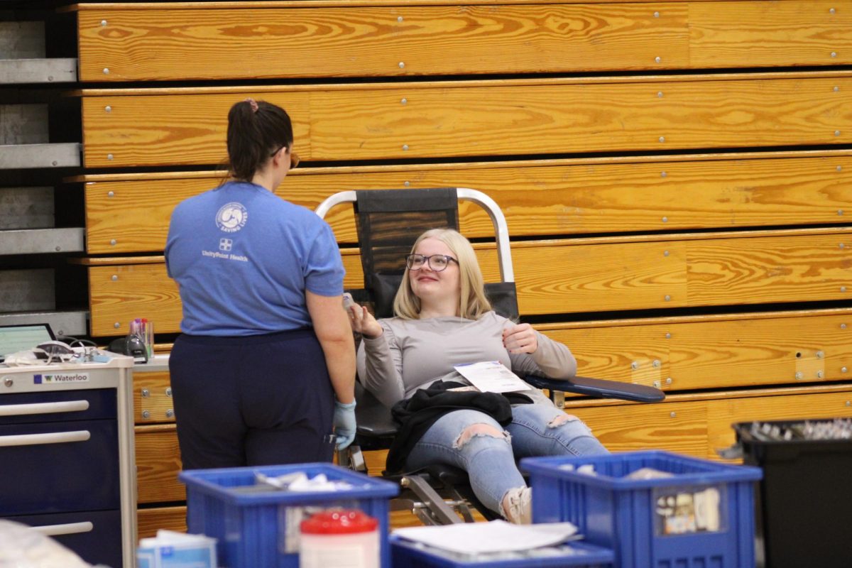 Smile for the Blood Drive
Sophomore Ashlyn Albert is ready to take some of her blood  for the people who need it.