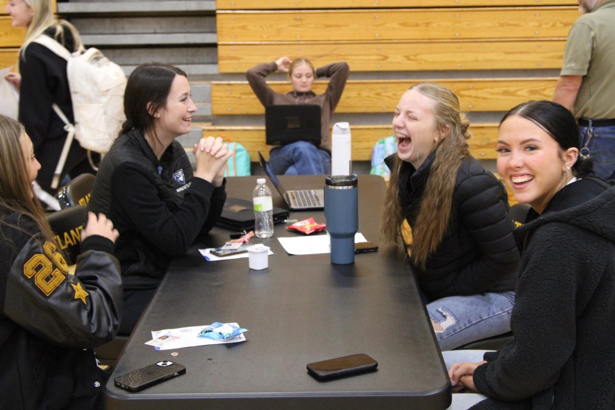 JOKES AND LAUGHTER
Seniors Lily Johnson, Jayci Reed, Claire Schroeder, and Lauren Comes relax while assisting with the blood drive.