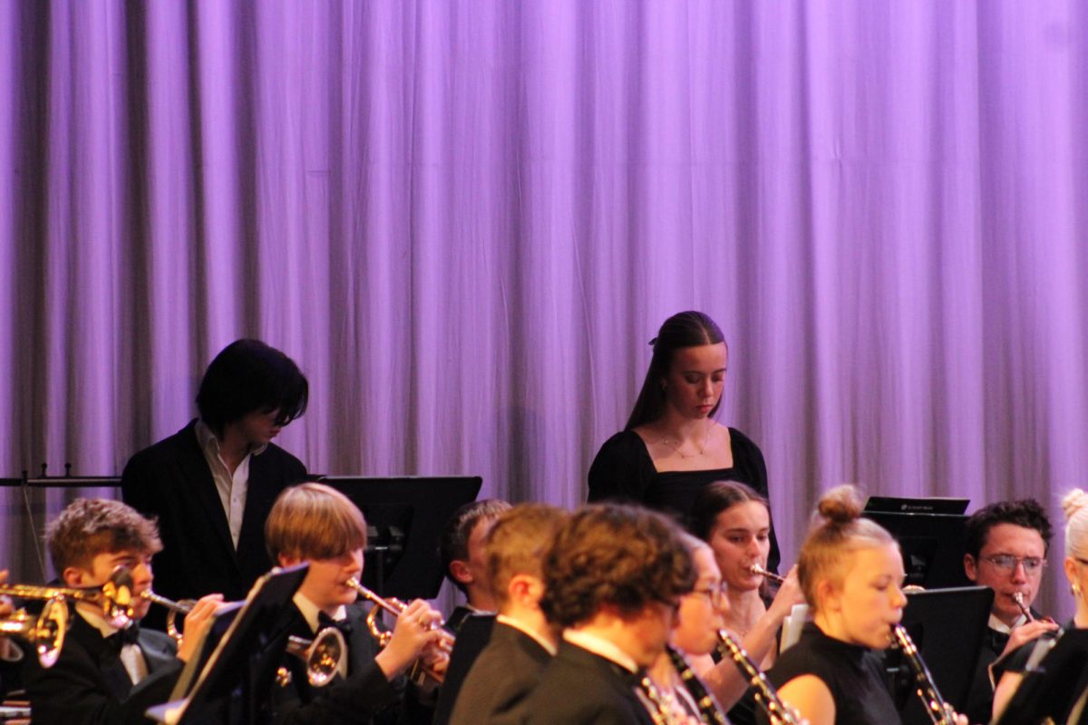 The percussion members stay focused in their music. Their teamwork and preparation was highlighted. 