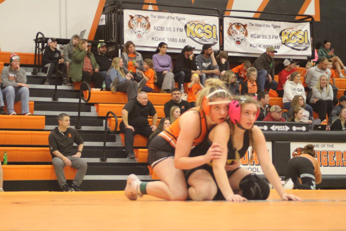 Faithlynn Scholl waits in the bottom position for the referee to say go. She stayed focused as she prepared herself for the restart. 