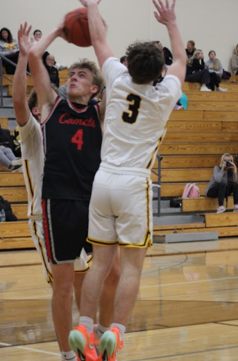 Player #3 blocks a North Polk player. Nelson jumped in contest to their player trying to score. 