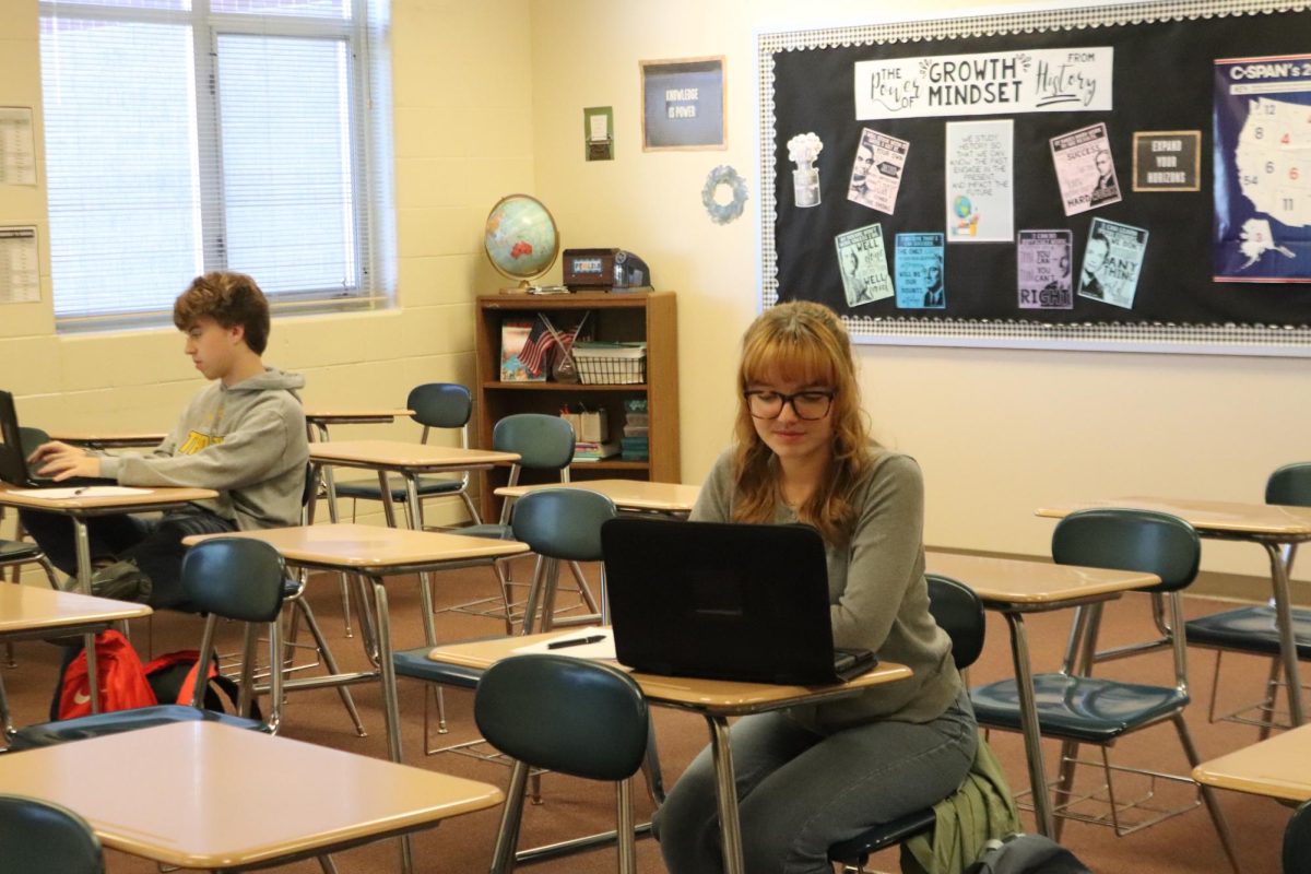 Senior Margaret McCurdy works hard on her school work. She shows why it is important to be in class and learning. 