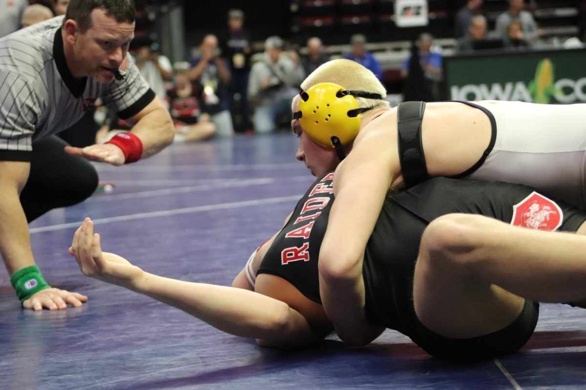 Dreven Smith, the Atlantic 175 pound state qualifier earns back points as he turns his opponent. He goes for the pin but his opponent was too quick and flips back to his stomach. Smith had wrestled at 165 all season until the state qualifier tournament to give himself the best chance at qualifying.