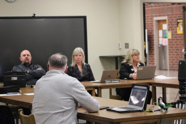 The school board prepares for the Feb. 11 meeting.