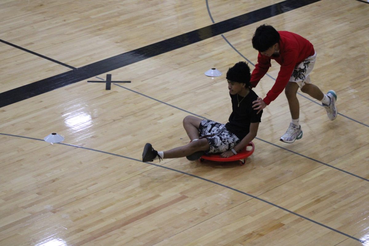 Freshmans RJ Fanuech and Ethan Alay are having fun pushing each other around. RJ says that its fun pushing people around and making them fall down like Ethan Alay.
