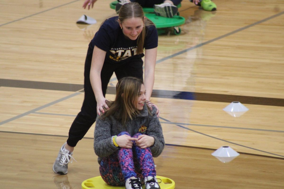 Sophomore Jaden Stewart and Junior Lily Willrich are having fun playing Mario go cart.Lily Says its is fun to play the Mario Cart game, and she said she fell down while she was pushes Jaden.