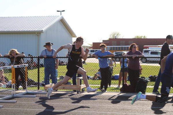 Zander Killion running in the shuttle hurdle at last year's home meet