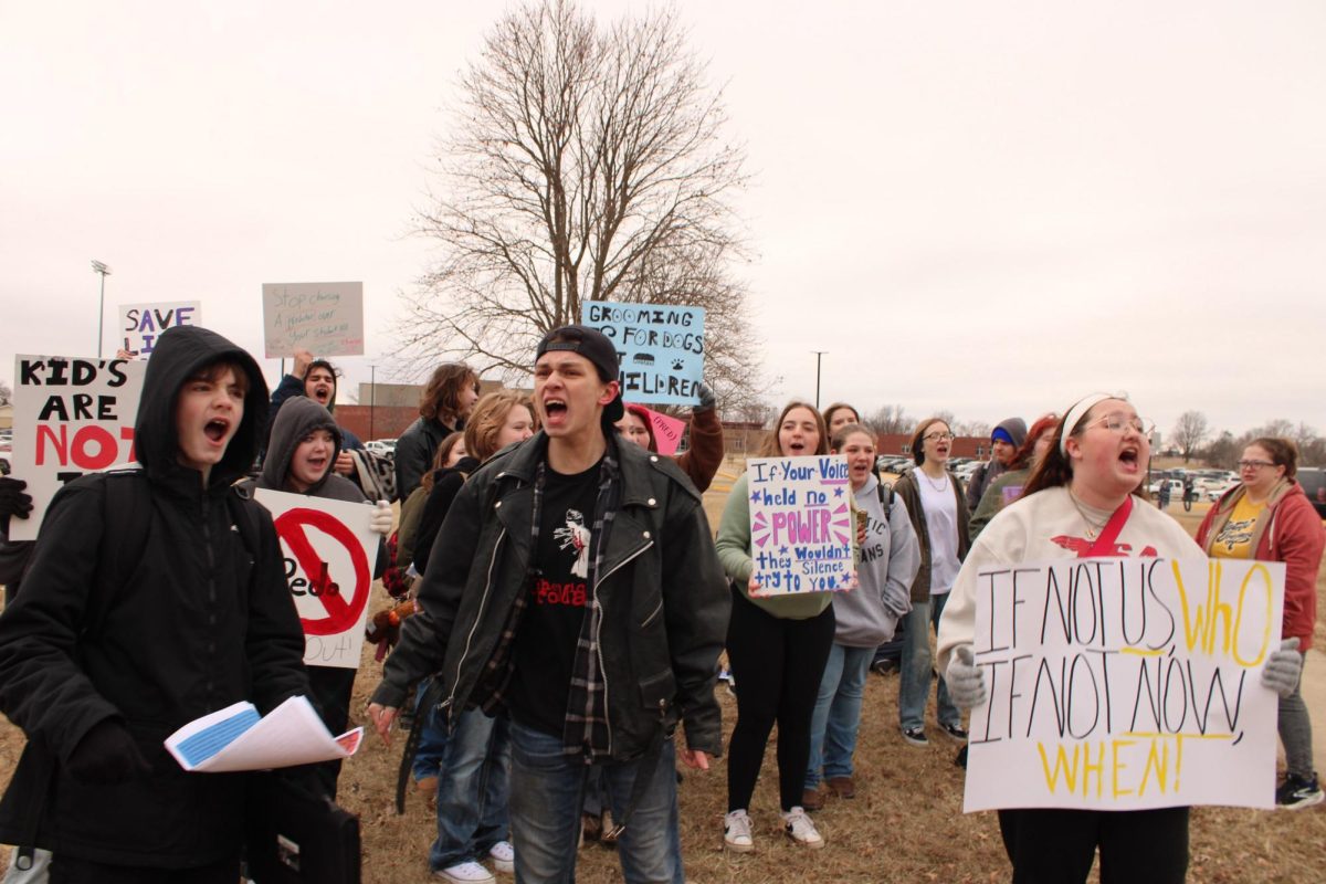 Students for Justice organizers at the Feb. 6 protest.  Organizers are in the foreground left to right, Spencer, Cook, and Mathis.