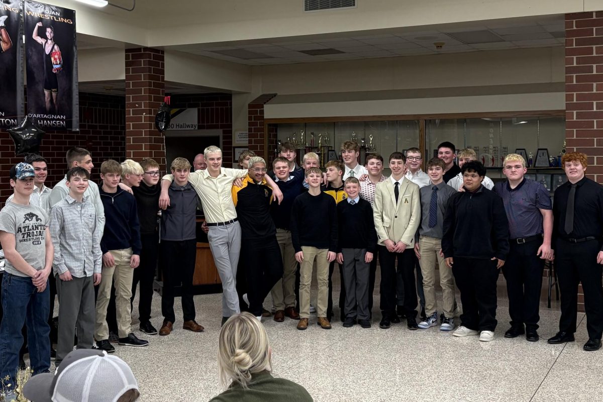 The 2025-26 wrestling team stands in-front of the audience as they are recognized for the hard work they put in this season. 