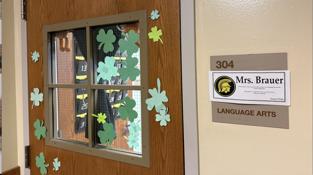Teacher Mandi Brauer's door is covered with shamrocks, indicating her participation in a staff morale-boosting game on Wednesday.