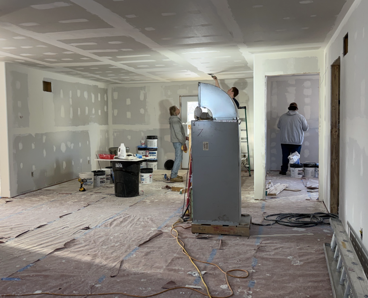 Students add Spackle to walls and ceilings. Preparing for the  students to add paint.  