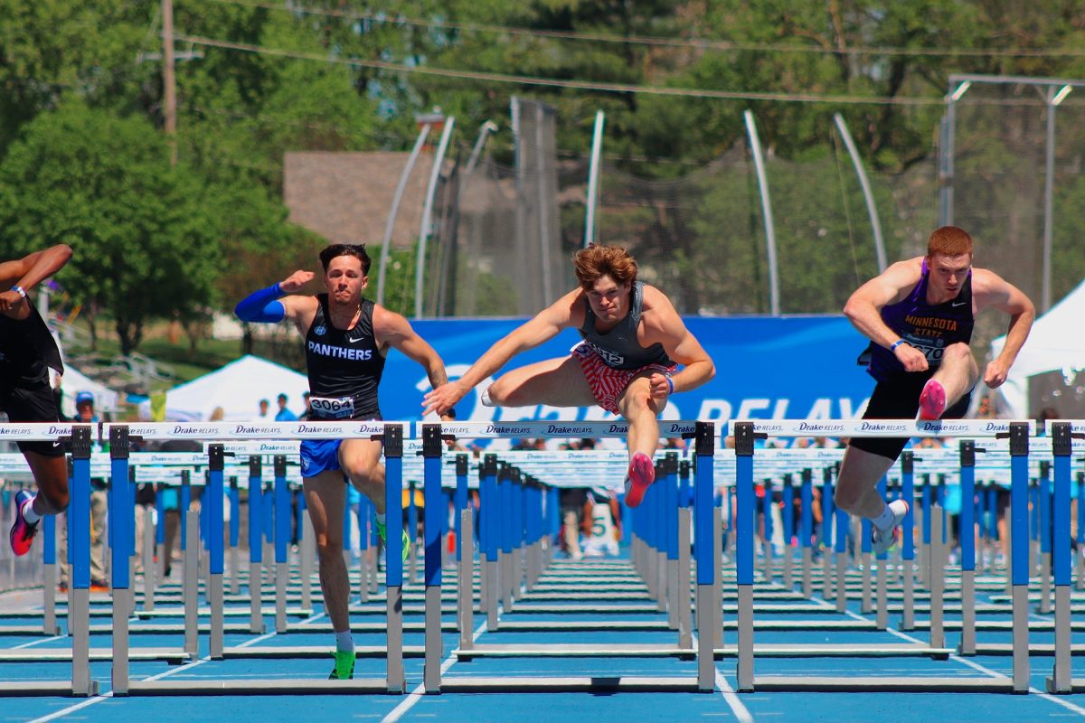 Close race as athletes rush to cross the finish line. 