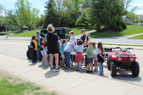 Elementary students look at an ATV during Farm Safety Day.
