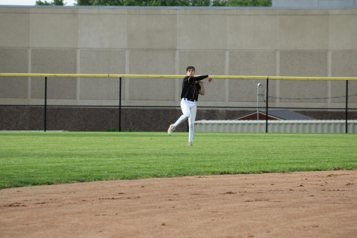 Kale Jensen throws the baseball back to base.