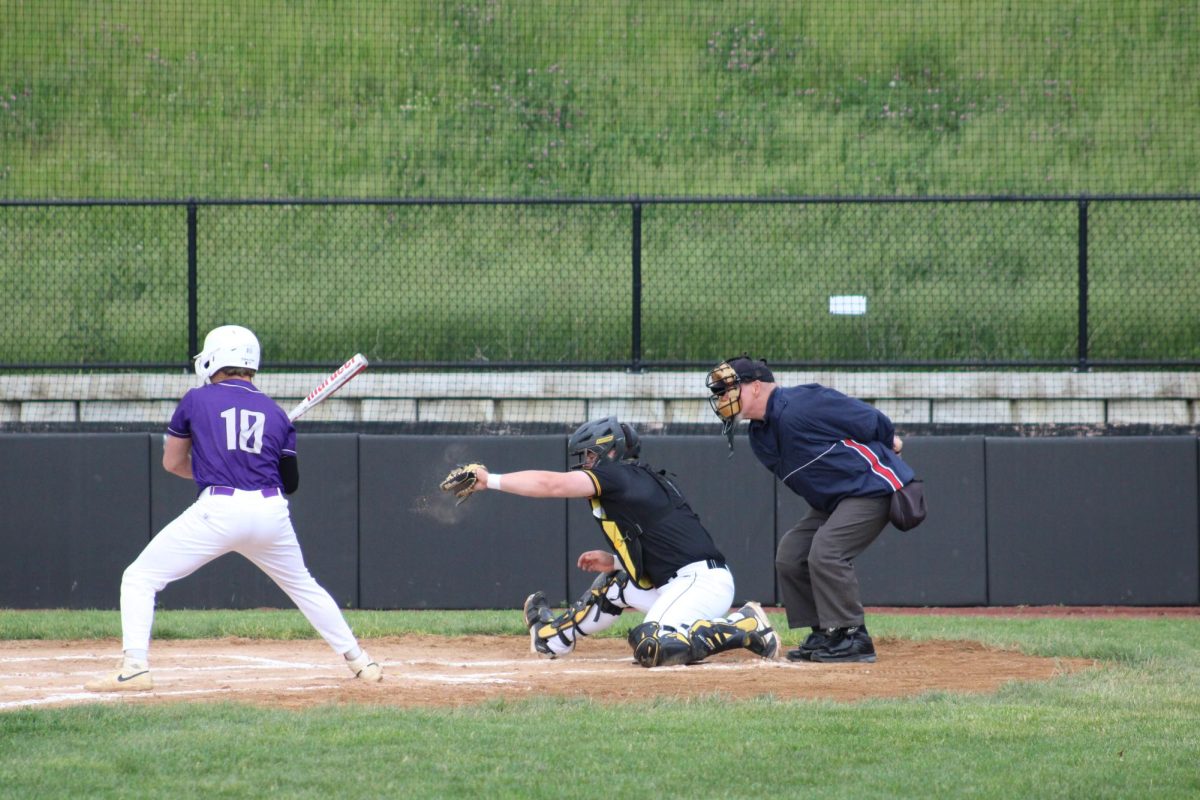 Senior Gavin McLaren catches the pitch.