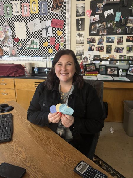 Science teacher Hannah Misner displays hearts students gave her.